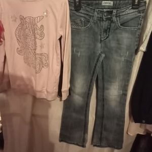 Unicorn sweater blue jeans